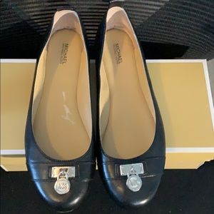 MK black flat shoes